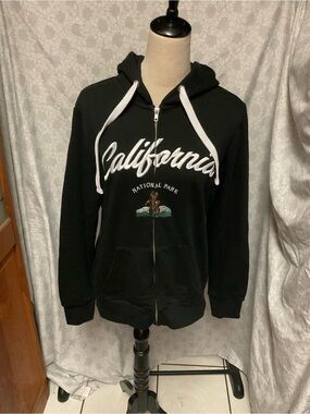 Reflex Black Zip-Up Hoodie Sweater with White Script